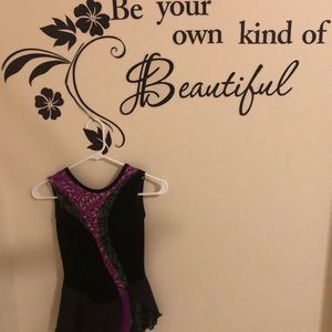 Jerry’s purple and green figure skating dress